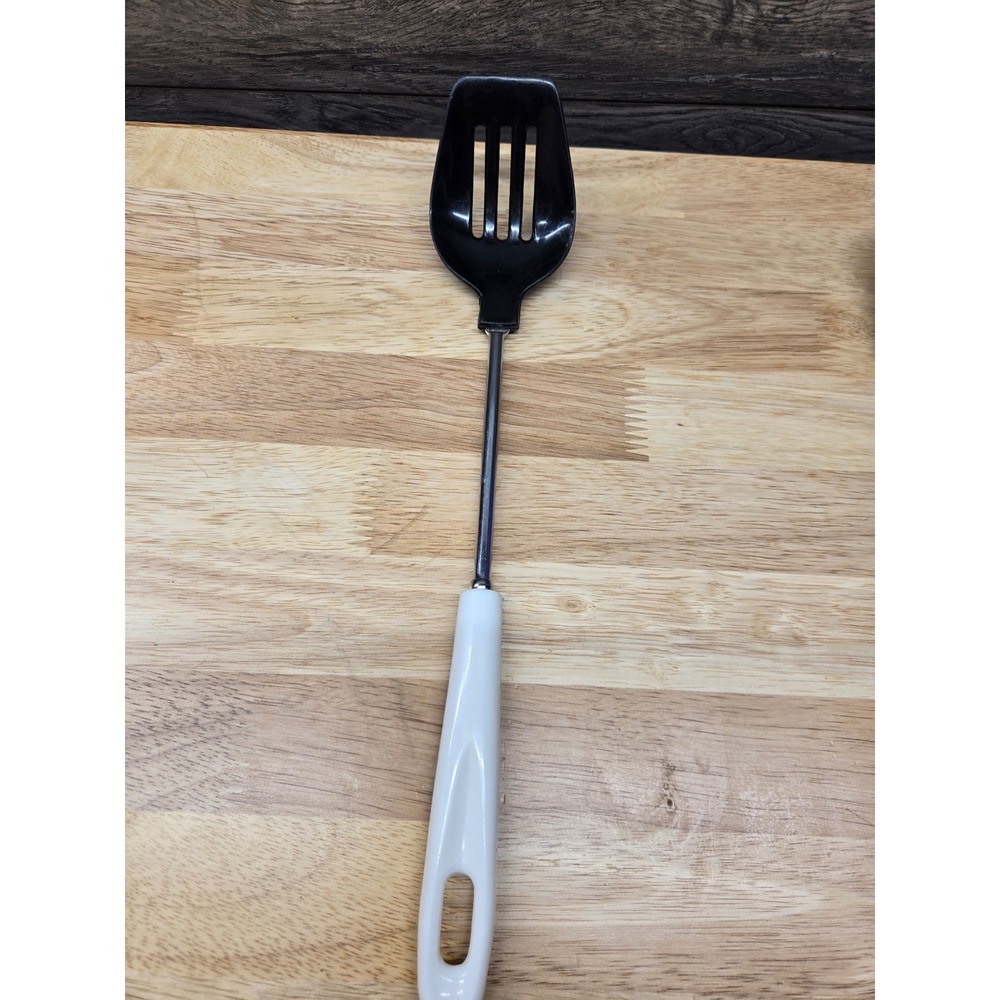 Vintage Slotted Spoon Black Nylon Head Stainless Steel Shaft White Handle
